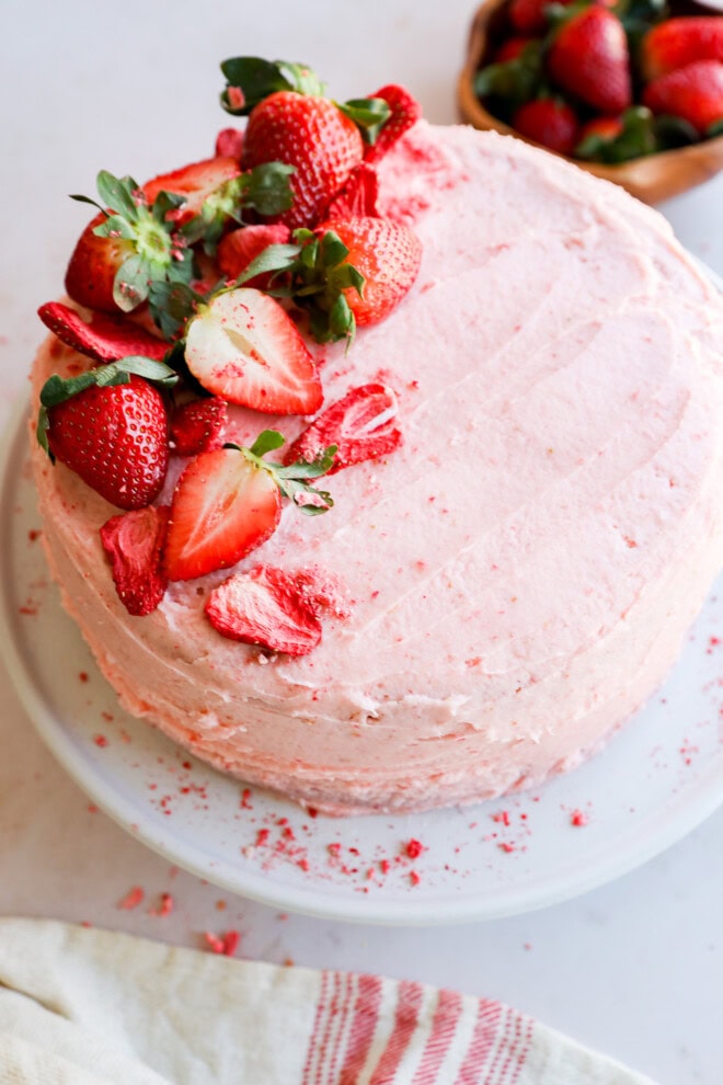 pink berry cake with fresh fruit frosting and center