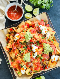 easy mexican appetizer that has lots of colorful toppings