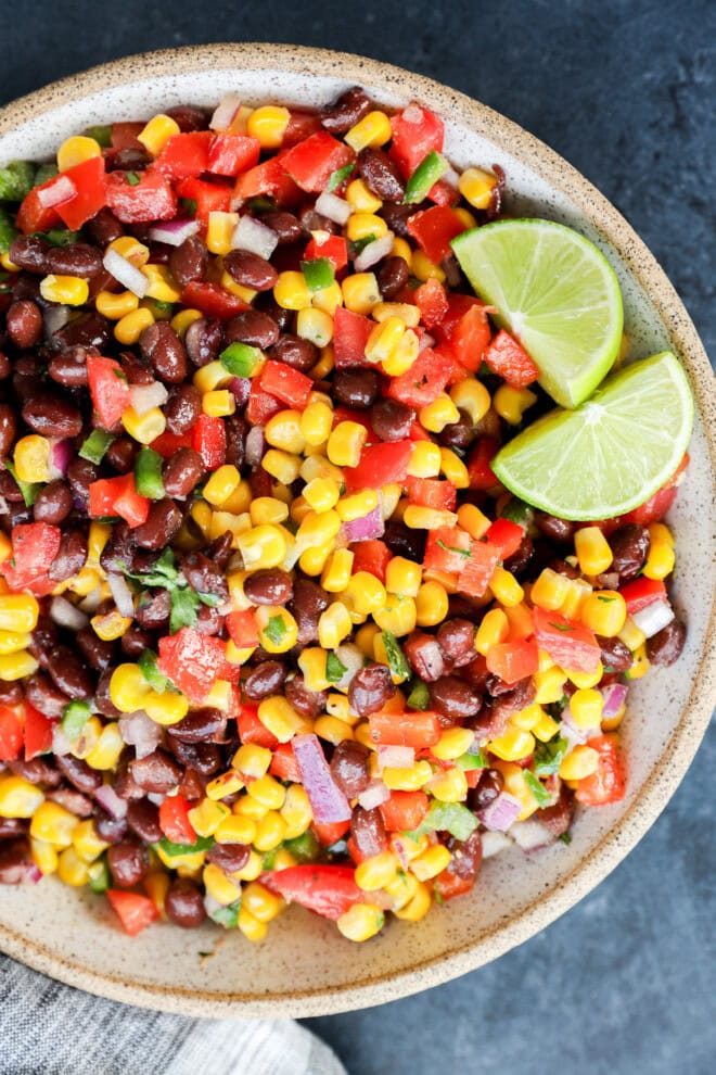 easy appetizer with fresh vegetables in a bowl with lime wedges