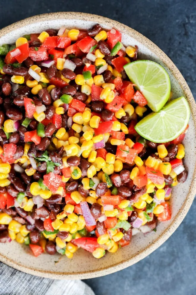 easy appetizer with fresh vegetables in a bowl with lime wedges