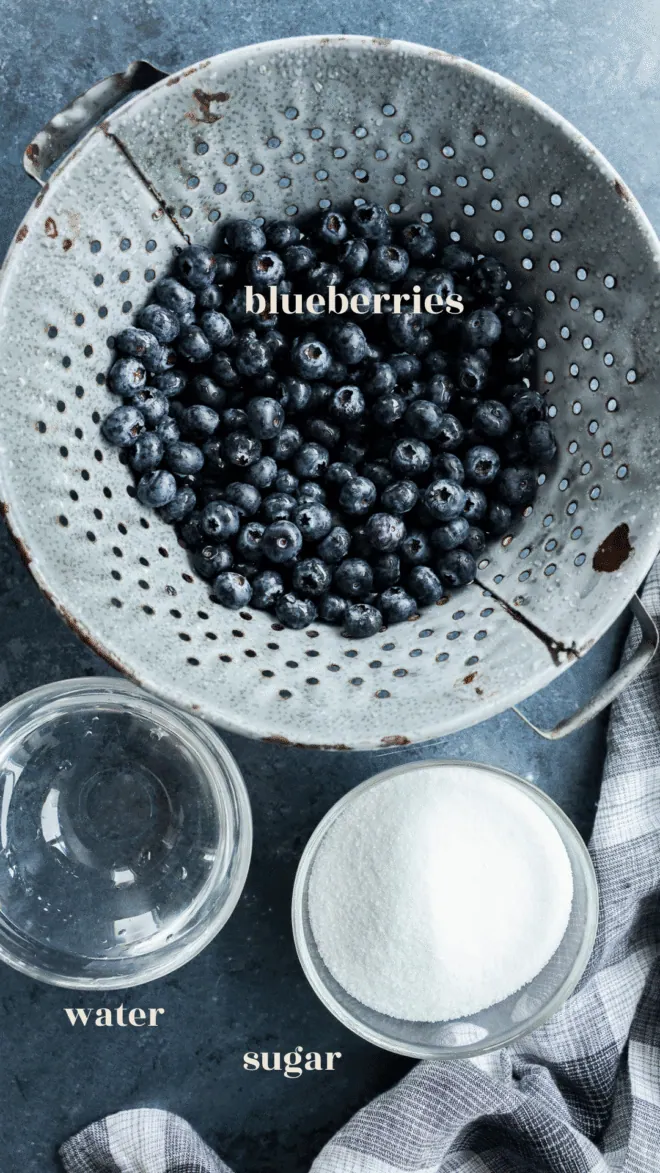 blueberry simple syrup ingredients in bowls with text labels