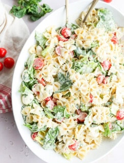 easy mixture of vegetables and penne with dressing in a large bowl