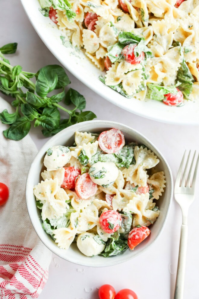 bowl of caprese bow tie pasta salad