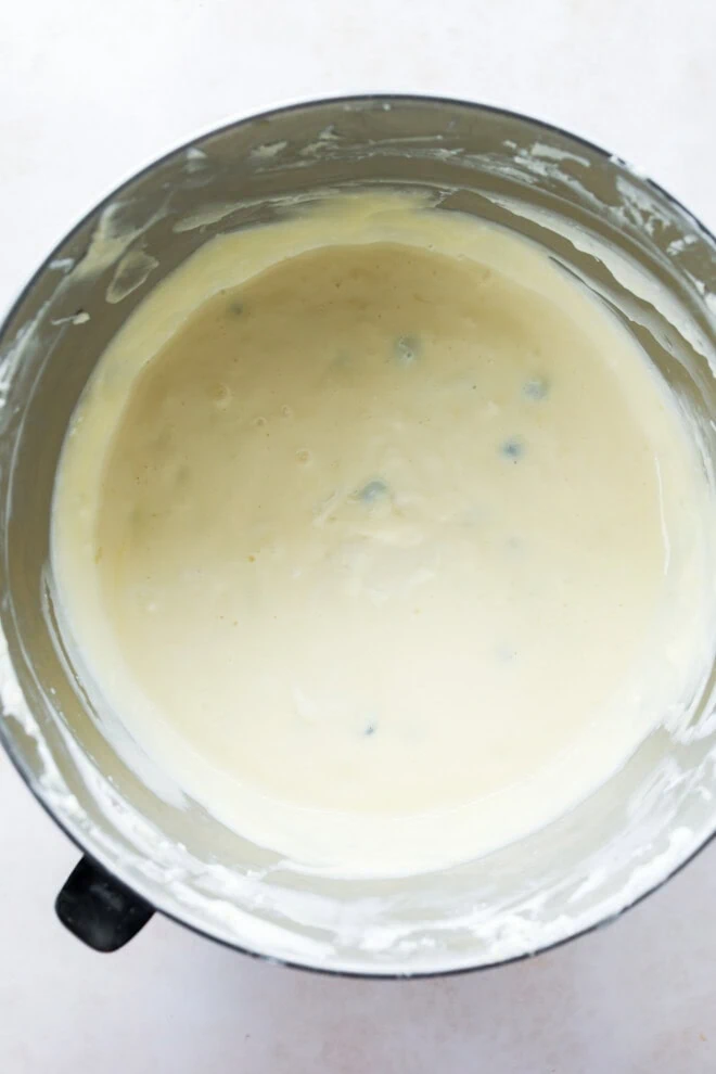 filling for cheesecake in bowl of stand mixer