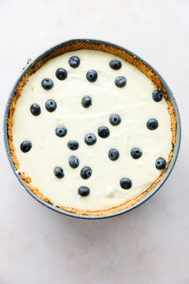 lemon blueberry cheesecake before baking in springform pan