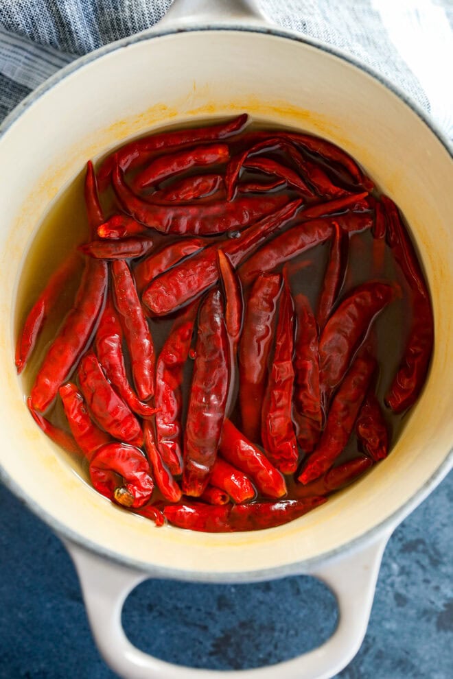 chiles de arbol in a saucepan cooked