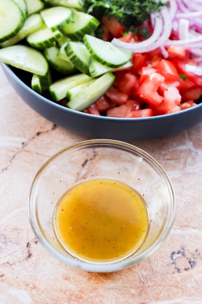 a red wine vinegar vinaigrette dressing in a small bowl