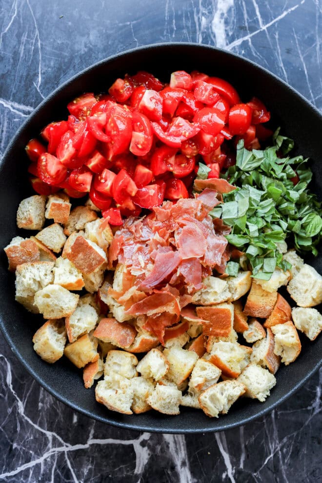 Panzanella Toscana ingredients in serving bowl before tossing