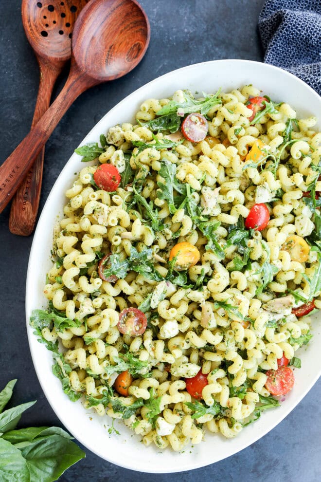 Easy protein and carb lunch recipe with fresh greens and wood serving utensils