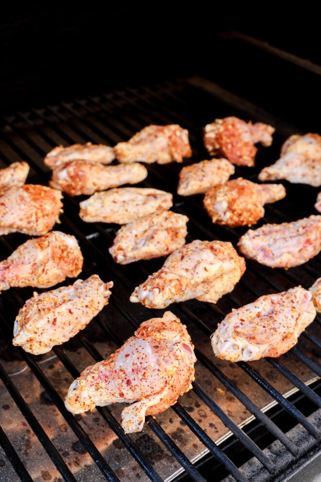 raw poultry on smoker before cooking