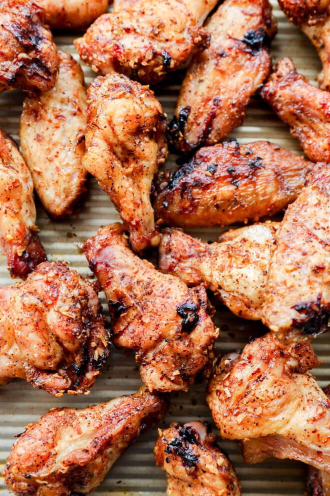 dry rub smoked chicken wings on baking sheet