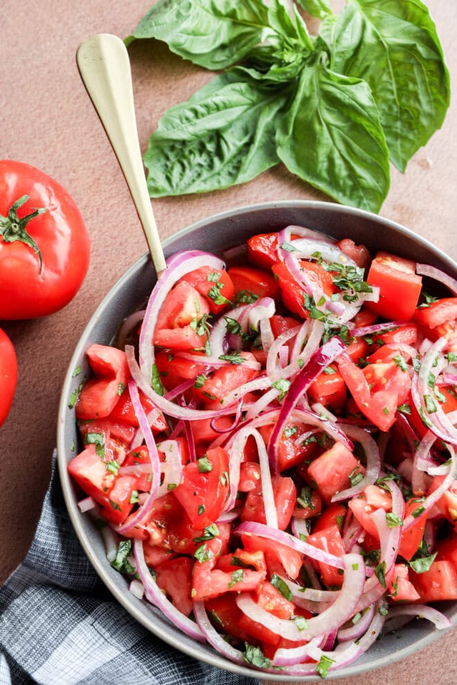 Summer side dish with fresh vegetables and basil