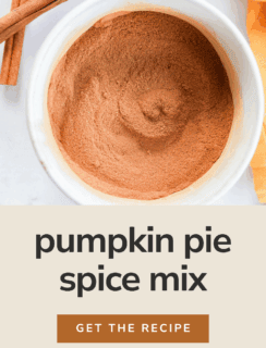 A bowl filled with fragrant pumpkin pie spice viewed from above, surrounded by cinnamon sticks and an orange cloth. Text below reads: pumpkin pie spice mix. Get the recipe. Cake n Knife.