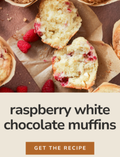 Overhead view of Raspberry White Chocolate Muffins, one split in half to reveal its soft inside, surrounded by fresh raspberries. Text reads Raspberry White Chocolate Muffins. Get the recipe. Cake Knife included.